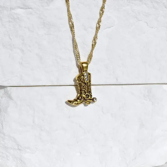 18K gold plated cowboy boot with spur pendant necklace by Sweet Cherry Sky, showcasing detailed western jewelry design