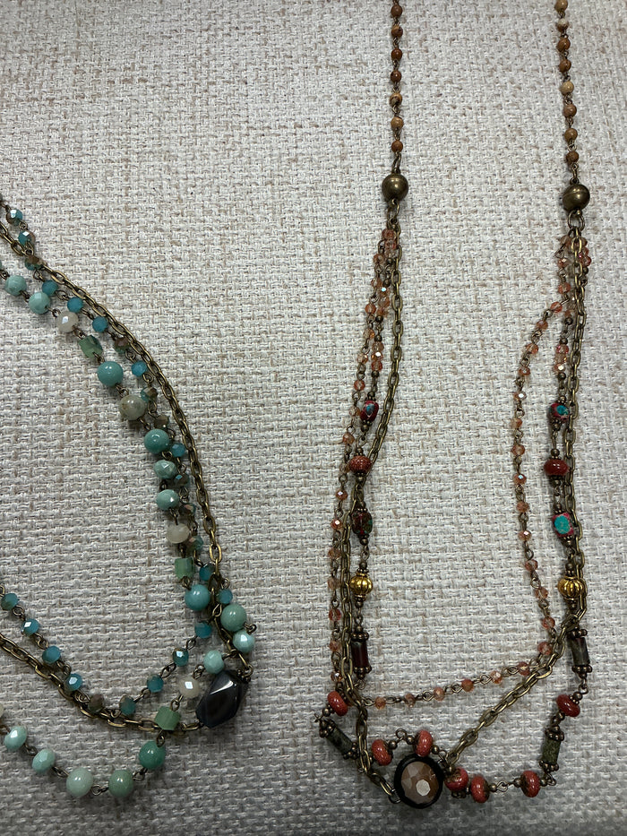 Beaded 2-in-1 necklace with colorful beads and layered design by American Unique Group, shown on a neutral background.