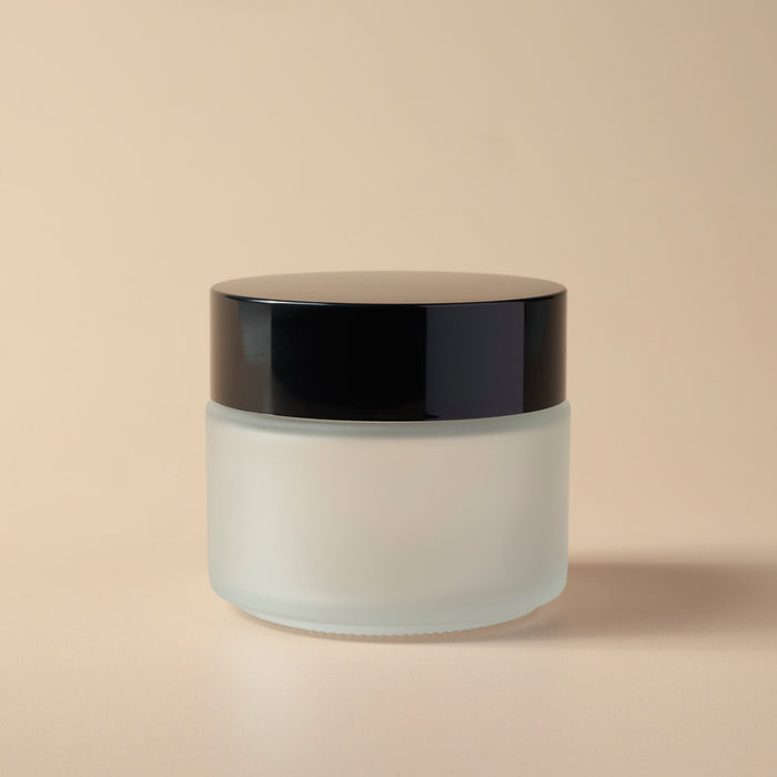 3.38 oz Frosted Glass Jar & Black Lid - close-up