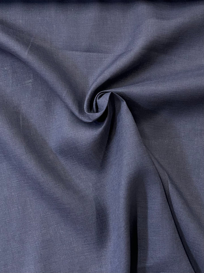 A beautiful navy mid-weight (handkerchief) linen in a swirl.
