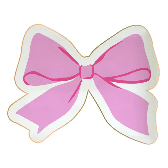 Pink ceramic trinket dish shaped like a bow, decorative tray by soiree-sisters for jewelry and small accessories.