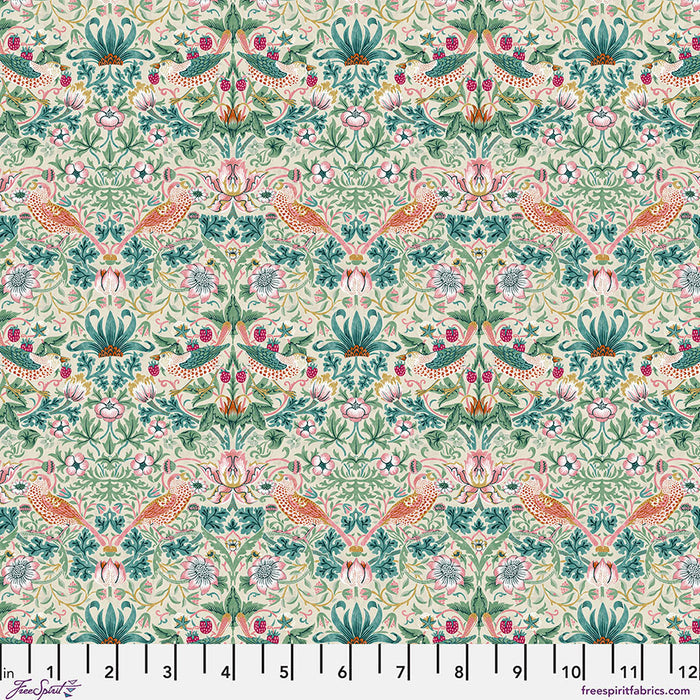 Patterned fabric with birds and flowers picking strawberries on a pink background, with green, teal, and pink foliage on a beige background. With a ruler at the bottom.
