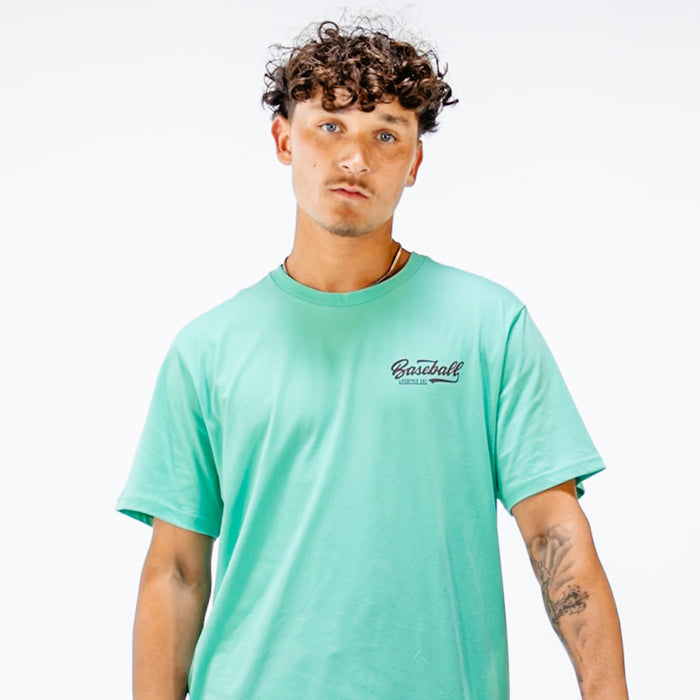 Man wearing a green t-shirt with 'Baseball Lifestyle 101' text in top corner