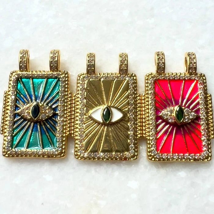 Chasing Cherubs graffiti-themed necklace with colorful pendant, showcasing street art style jewelry on a chain.