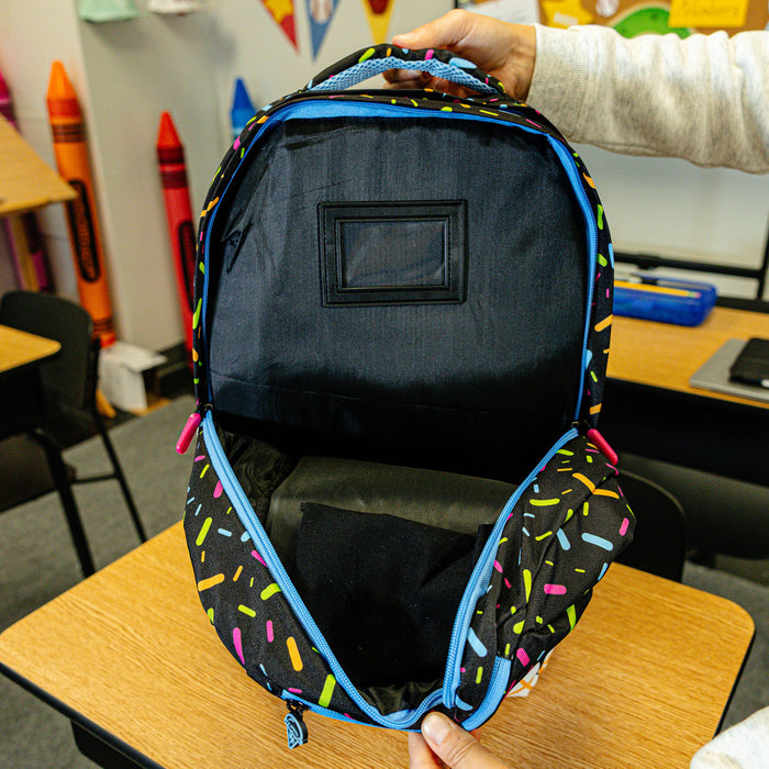 Black backpack with "Midnight Sundae SZN 2" design — back view
