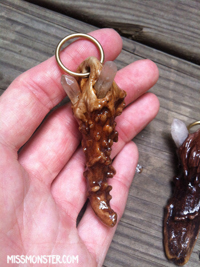 PENDANTS-SCULPTED ANTLER TIPS WITH QUARTZ