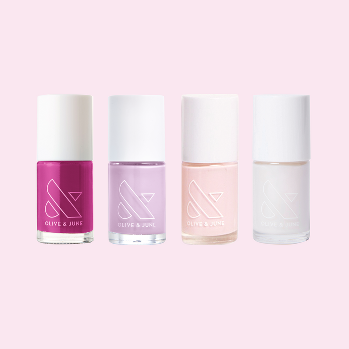 Sheer Luck nail polish set with pink and purple sheer shades for a sophisticated long-lasting at home manicure