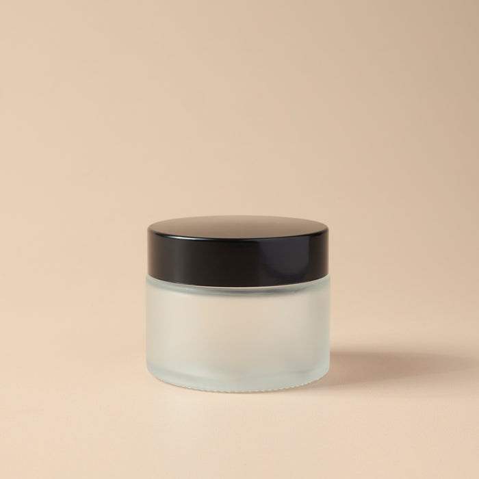 1.69 oz Frosted Glass Jar & Black Lid - close-up