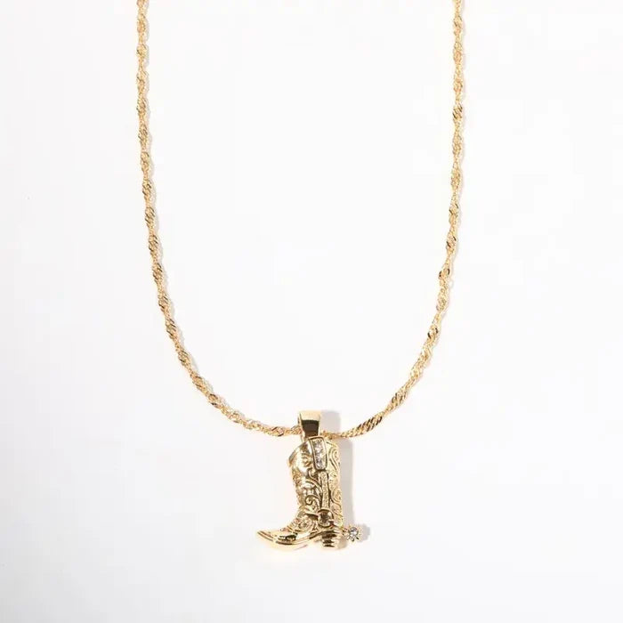 18K gold plated cowboy boot with spur pendant necklace from Sweet Cherry Sky, detailed close-up of the jewelry piece.