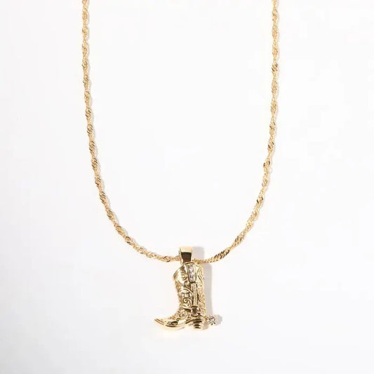 18K gold plated cowboy boot with spur pendant necklace from Sweet Cherry Sky, detailed close-up of the jewelry piece.