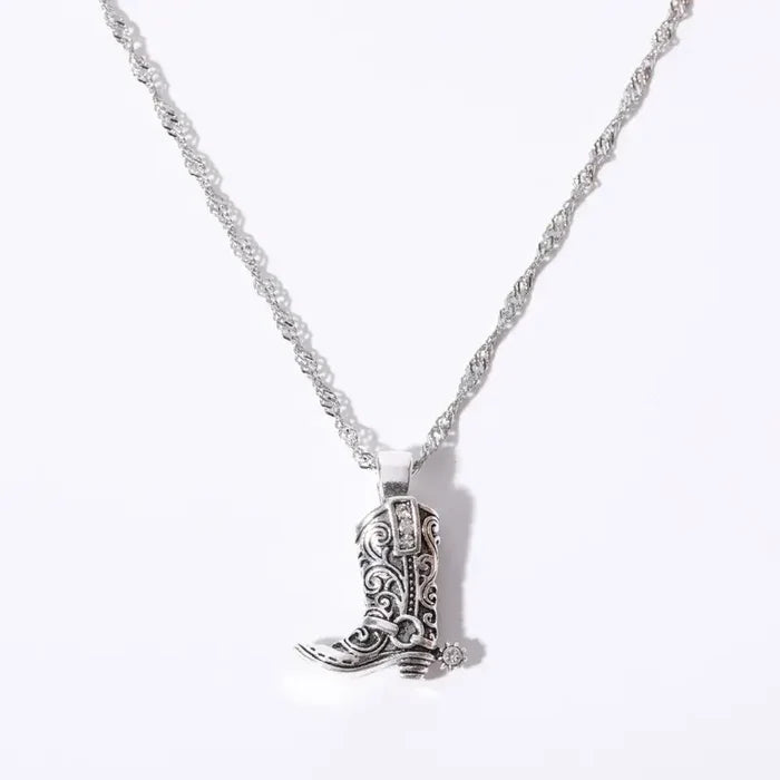 18K gold plated cowboy boot with spur pendant necklace by Sweet Cherry Sky, showcasing detailed Western-style jewelry.