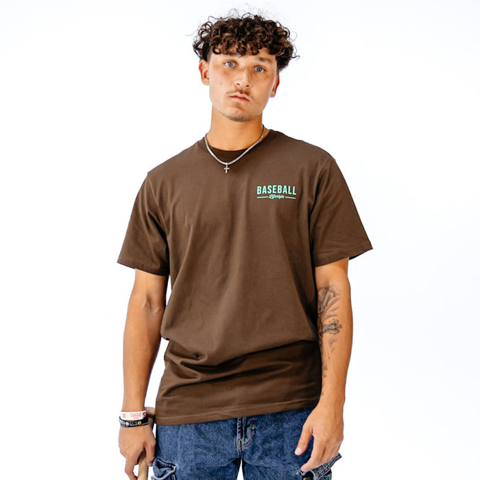Man wearing a brown t-shirt with 'BASEBALL' printed on it against a white background