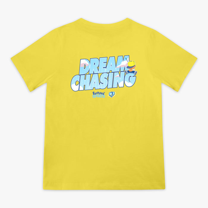 Yellow t-shirt with 'Dream Chasing' text and Pablo Sanchez design on a white background