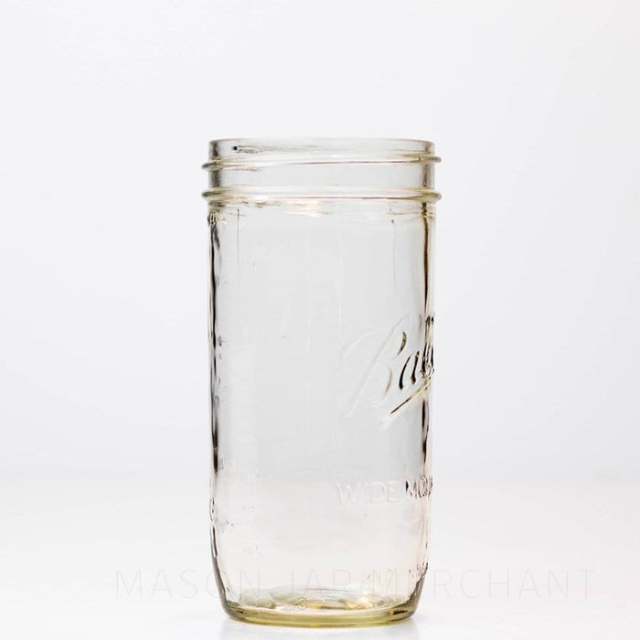 side of a 24 oz wide mouth Ball mason jar against a white background
