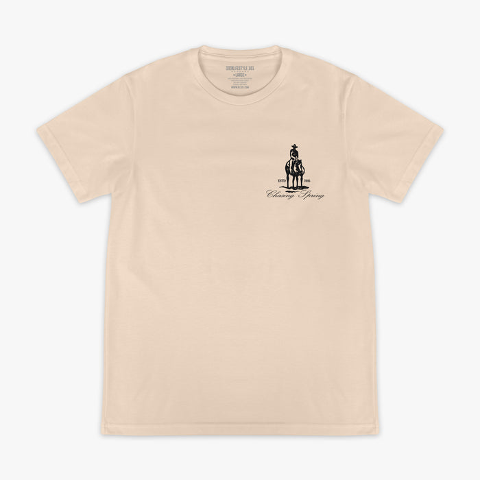 Beige t-shirt with a graphic of a person on a horse and text 'Offseason Chasing Spring' on a white background