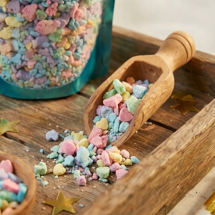 Colorful Roxy Grace Bath Bomb Confetti with vibrant floating pieces, perfect for a relaxing bath experience.