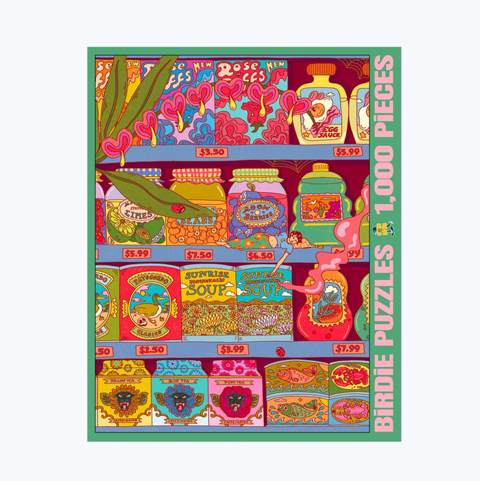 Experience the Between Days 1,000 Piece Jigsaw Puzzle by Birdie Puzzles—a beautifully illustrated box brimming with vibrant jars and cans stacked on shelves, each adorned with playful soup names and prices. Made from premium Blue Kappa chipboard, this eco-friendly puzzle promises quality and sustainability. The side of the box proudly displays: BIRDIE PUZZLES 1,000 PIECES.