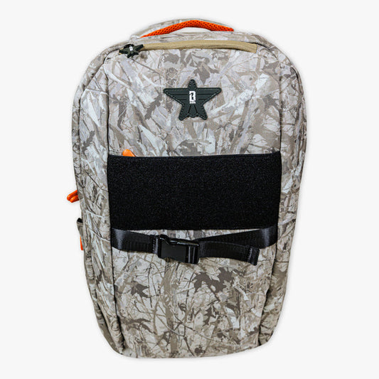 Adult model wearing multi-color backpack with "Born To Fly SZN 2" design