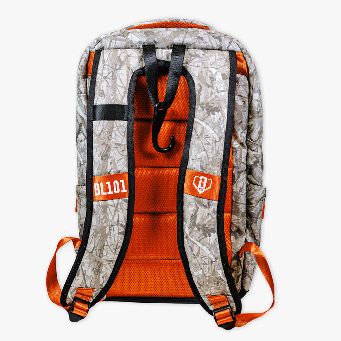 Adult model wearing multi-color backpack with "Born To Fly SZN 2" design