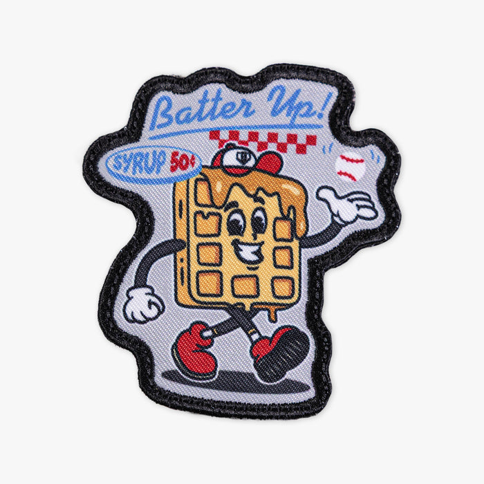 Adult model wearing multi-color patch with "Breakfast Patch" design