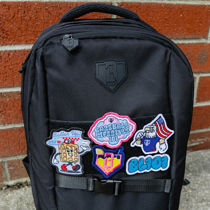 Adult model wearing multi-color patch with "Breakfast Patch" design