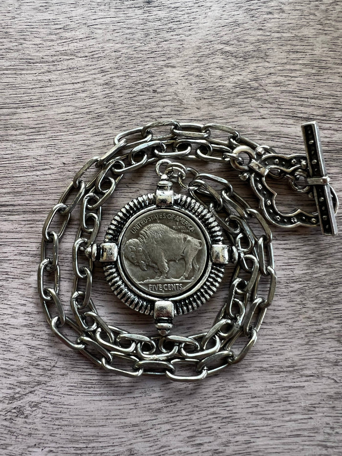 Buffalo necklace by Chasing Cherubs featuring a detailed buffalo pendant on a delicate chain.