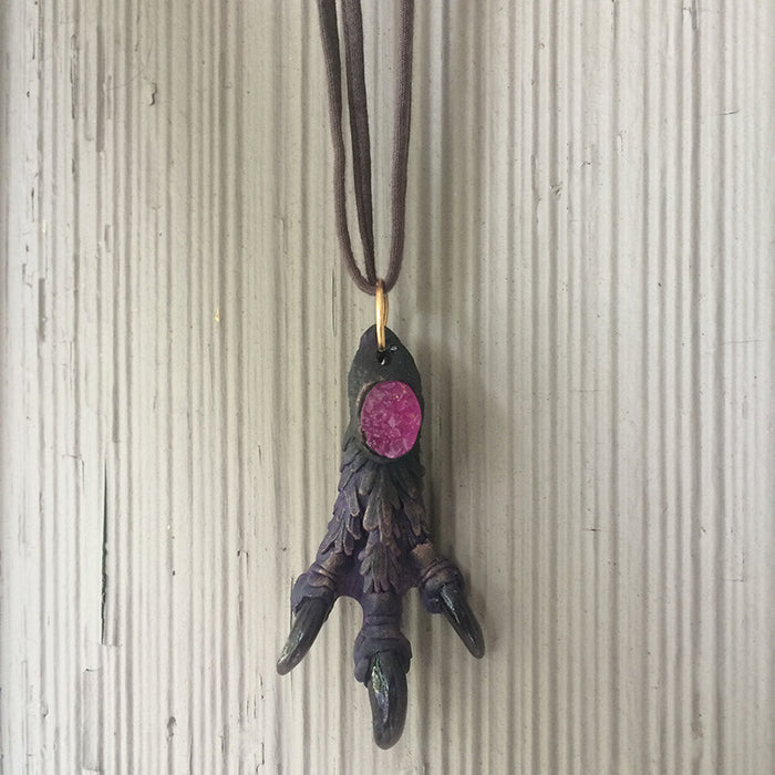 CAST MONSTER FOOT PENDANT