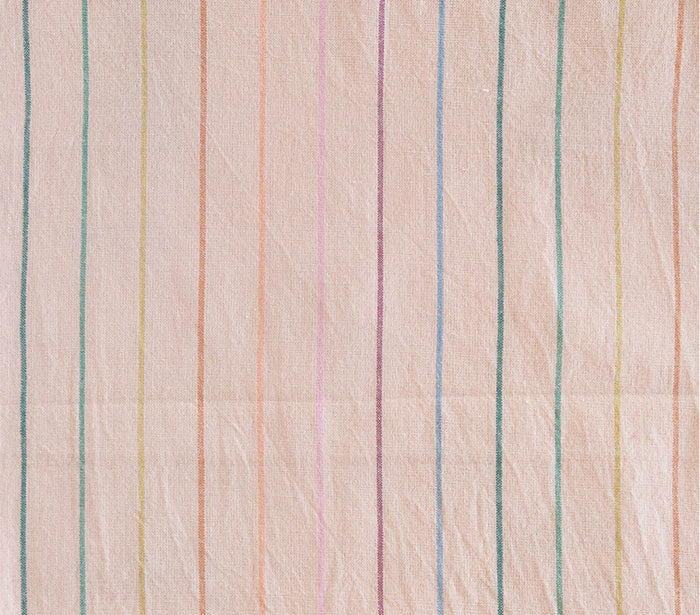 peach fabric with rainbow skinny stripes