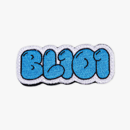 Adult model wearing blue patch with "Cotton Candy Blue Patch" design