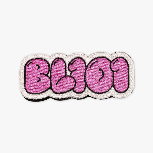 Adult model wearing pink patch with "Cotton Candy Pink Patch" design