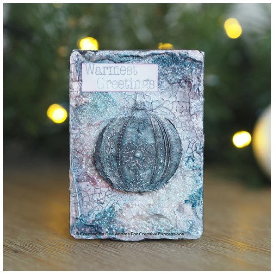 Creative Expressions - Designer Boutique Pre Cut Rubber Stamp - Bauble Pendant. A beautiful DL size stamp with a wonderful scene in one stamp making creating stunning projects simple. This pre-cut rubber stamp has great detail and will make fantastic, intricate paper craft projects, and so much more.  Available at Embellish Away located in Bowmanville Ontario Canada. Mixed media card example