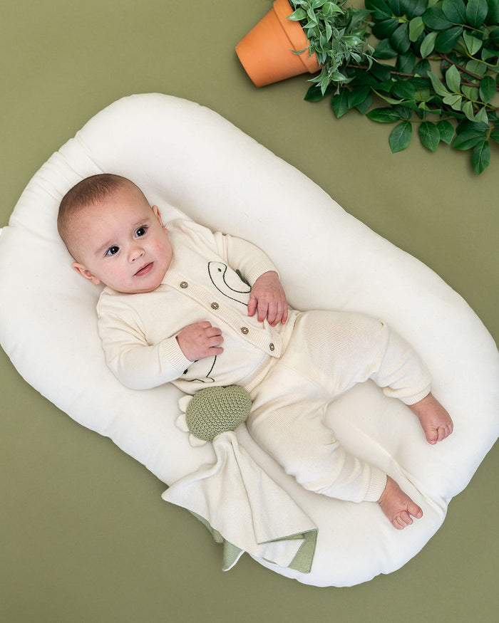 Dino 3D Embroidered Baby Knit Cardigan (Organic Cotton) - Model with Dino Lovey