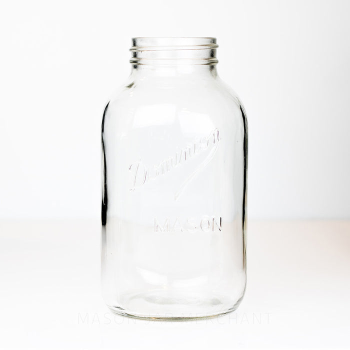 Vintage regular mouth two-liter jar with Dominion logo against a white background.