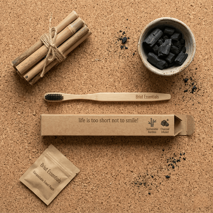 Biodegradable bamboo toothbrush handle close-up showing natural bamboo grain