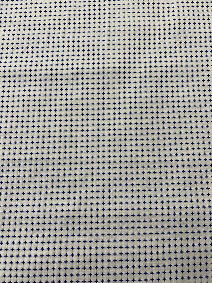 Textile fabric with a small star pattern on a neutral background