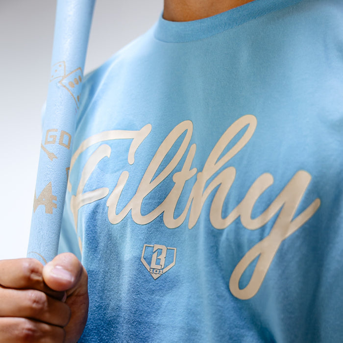 Light blue t-shirt with white 'Filthy' text and logo on a plain background