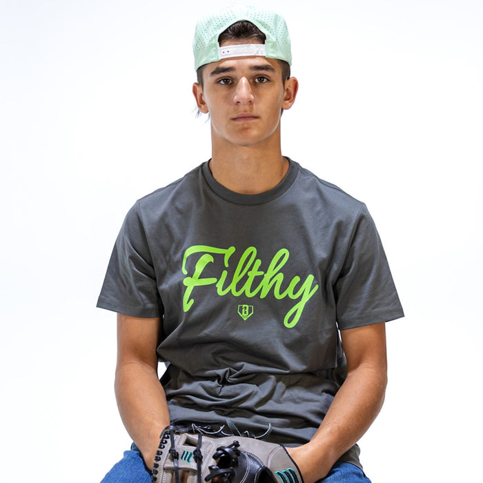 Person wearing a gray t-shirt with 'Filthy' printed in green on a white background