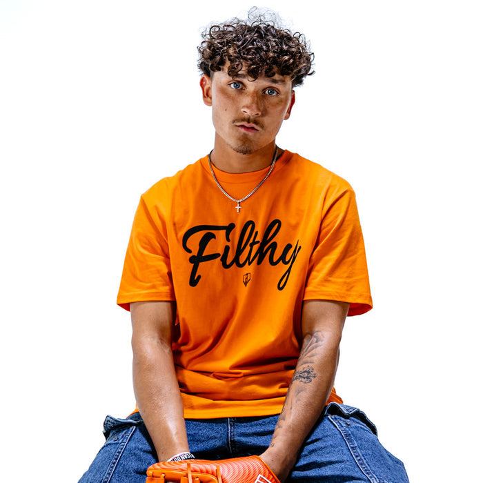 Person wearing an orange 'Filthy' t-shirt