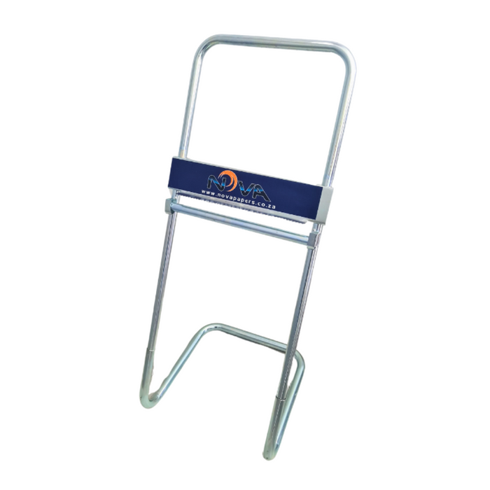 Metal floor stand with a paper towel roll holder on top. The stand is silver-colored with a logo visible on a blue label on the holder.