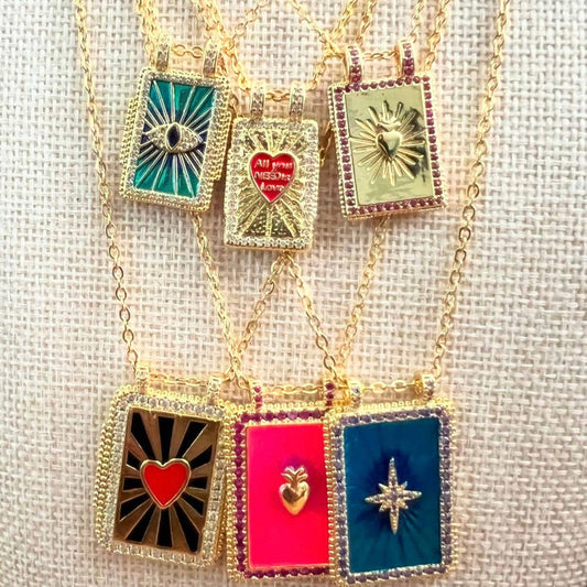 Chasing Cherubs graffiti-themed necklace with colorful pendant and chain, stylish jewelry accessory for casual wear