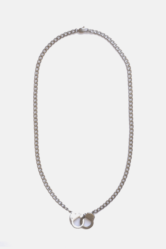 Curated Basics handcuff chain necklace featuring linked metal cuffs, stylish jewelry accessory for edgy fashion.