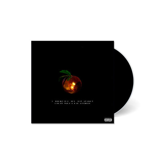 A CD by Waterparks with a black cover features a peach illustration in the center, small white track titles below it, and a parental advisory label in the bottom right. The CD, I Miss Having Sex But At Least I Dont Wanna Die Anymore, is partially visible on the right.