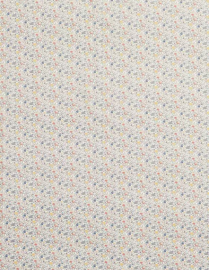 This vibrant fabric has a beautiful vintage ditsy floral print of blue, reds, greens, and yellows.