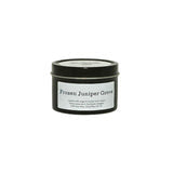 Little Cow Co. candle tin featuring a fir scent, with a natural wood-inspired design on the metal container.