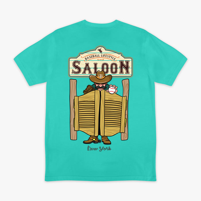 Teal t-shirt with a graphic of a saloon door and cowboy, on a white background