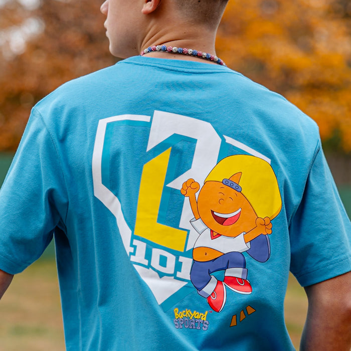Adult model wearing blue graphic tee with “Pablo Power” design
