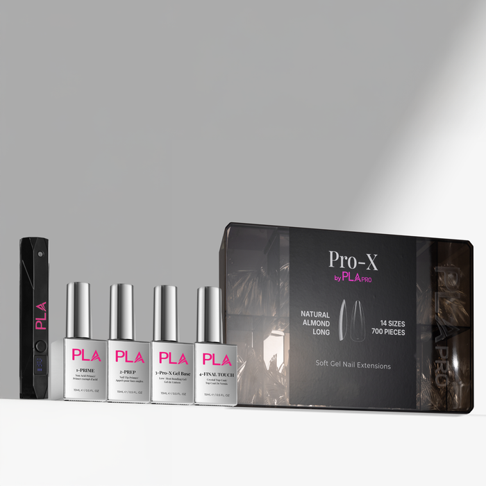 Set of Pro-X by PLA nail extension products including bottles and a box on a gray background