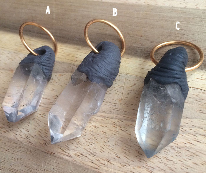 QUARTZ WITH SCULPTED BITS PENDANTS
