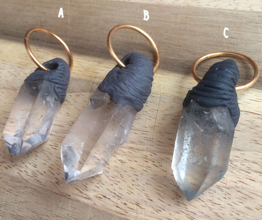 QUARTZ WITH SCULPTED BITS PENDANTS