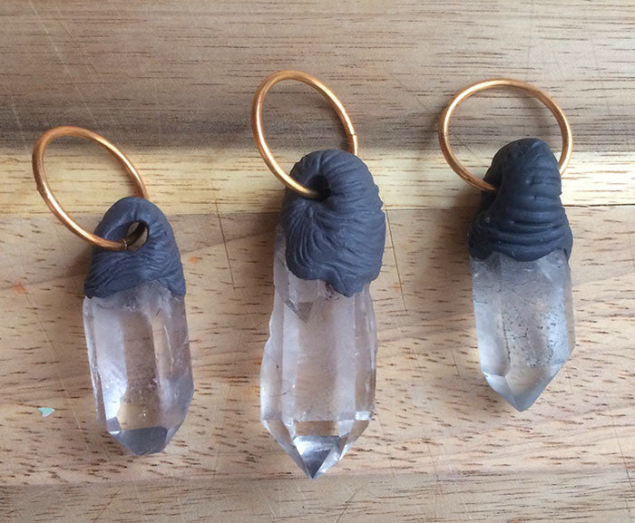 QUARTZ WITH SCULPTED BITS PENDANTS